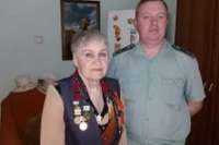 Минусинские приставы поздравили с 9 Мая ветерана службы